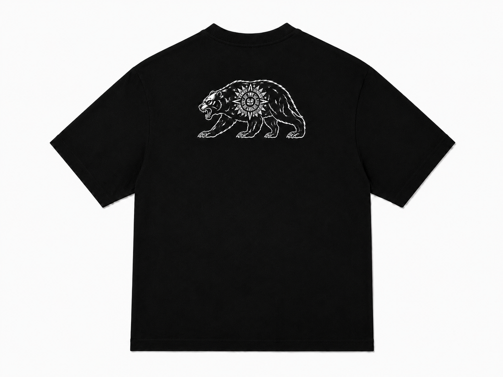 Black t-shirt with a white bear graphic and a sun in the middle on the back